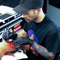 Tattoo artist Joshua at Venom Ink